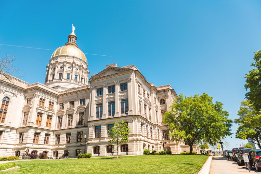 The Georgia State Capitol building against a blue sky