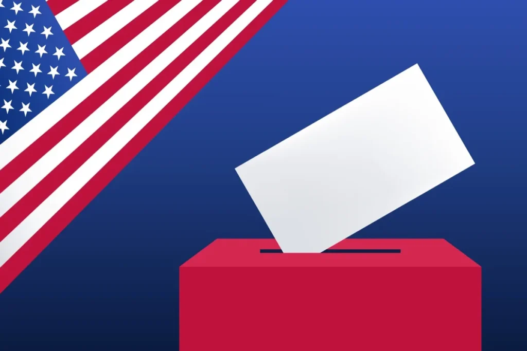 White ballot dropping into a red ballot box beside an American flag